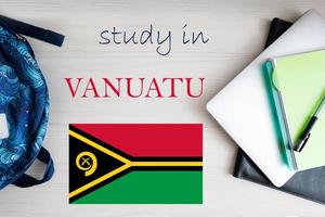 Study in Vanuatu. Background with notepad, laptop and backpack. Education concept. photo