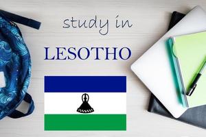 Study in Lesotho. Background with notepad, laptop and backpack. Education concept. photo