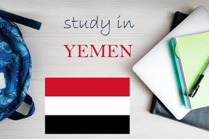 Study in Yemen. Background with notepad, laptop and backpack. Education concept. photo