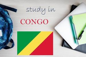 Study in Congo. Background with notepad, laptop and backpack. Education concept. photo