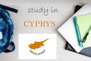 Study in Cyprys. Background with notepad, laptop and backpack. Education concept. photo