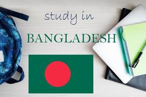 Study in Bangladesh. Background with notepad, laptop and backpack. Education concept. photo
