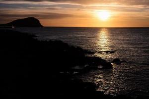 Sunset over the sea photo