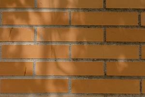 original abstract background from clay brown bricks in closeup photo