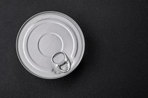 Tin metal can with canned food round shape with a key photo