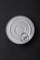 Tin metal can with canned food round shape with a key photo