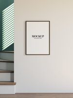 Minimalist frame mockup on the white wall psd