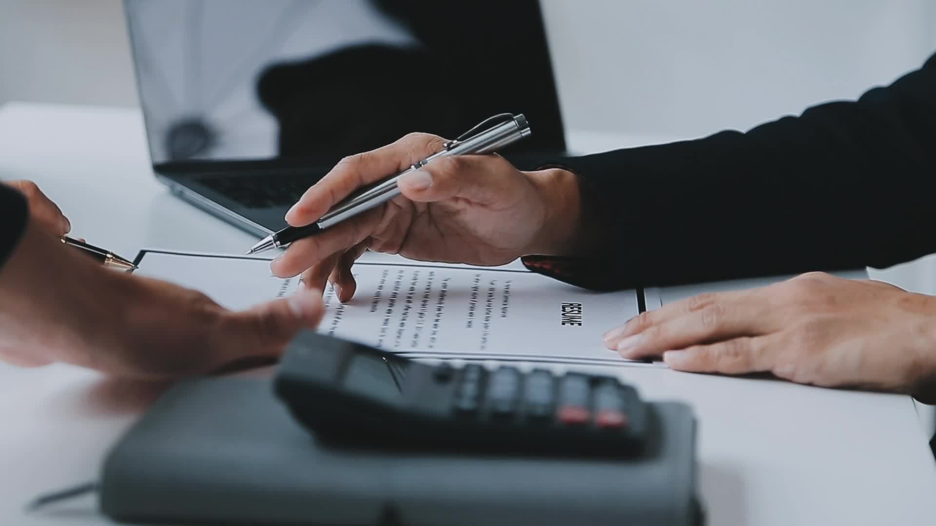 Businessman or job seeker review his resume on his desk before send to