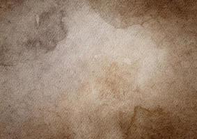 Abstract old brown watercolor stains background on watercolor paper textured for design templates invitation card photo