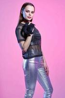 attractive woman fashion clothes glamor party posing pink background photo