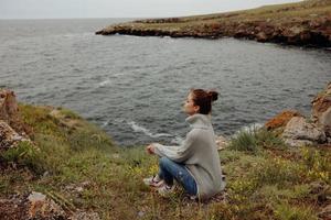 woman nature rocks coast landscape Ocean unaltered photo