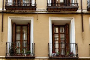 antique windows in buildings in the old town of Saragossa, Spain photo