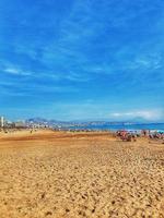 calm seaside landscape of san juan beach in alicante spain on a sunny day photo