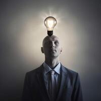 A man with a light bulb intead of head photo