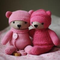 A knitted toy with a pink sweater on it photo