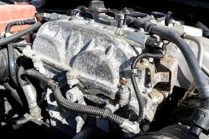 Car engine covered with corrosion after exposure to water photo