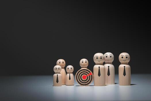 concept of business achievement objective target, teamwork for success. target board icon and wooden doll icon with copy space for business design photo