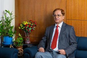 Bangladesh April 11, 2019, ASA Association for Social Advancement President Md Shafiqul Haque Chowdhury giving an interview in his office room at ASA Tower, Shyamoli, Dhaka. photo