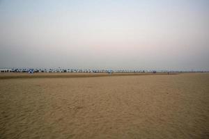 The early morning empty view of the longest sandy sea beach Cox's Bazar. photo