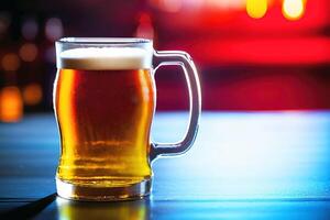 Beer in a glass mug with blur bar background, photo