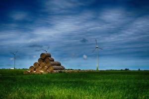 picturesque spring landscape with blue sky and green fields photo