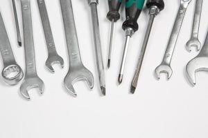 Set of tools for repair in a case on a white background. Assorted work or construction tools. Wrenches, Pliers, screwdriver. Top view photo