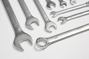 Set of tools for repair in a case on a white background. Assorted work or construction tools. Wrenches, Pliers, screwdriver. Top view photo