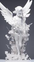 angel girl statue fall from heaven photo