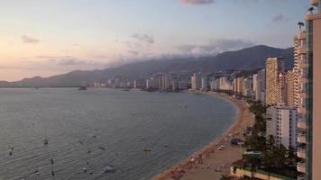 timelapse of the huge bay of hotels stretching along the coast in acapulco, mexico video
