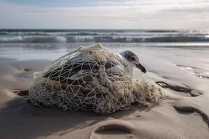 bird caught in a plastic bag. photo