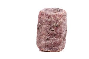 Macro mineral stone Ruby in the breed a white background photo