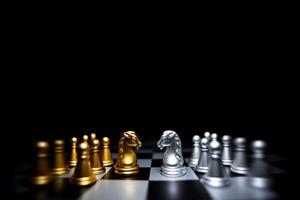 Strategic planning and leadership. Chess game on black and white background. Concept of business showing leadership, decision making, brainstorming with copy space for text. photo