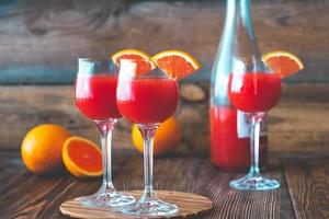 Three glasses of Mimosa cocktail photo