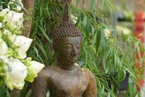 Buddha images for pouring blessings on the Songkran day photo