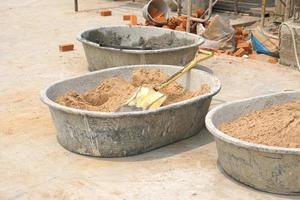 Mix sand and cement for construction. photo