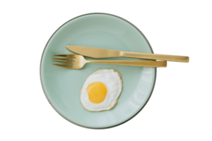 Eggs with gold cutlery isolated on a transparent background png