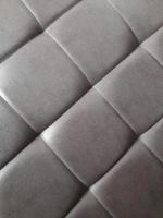 Leather upholstery. Leather upholstery with square stitching. Vintage background photo