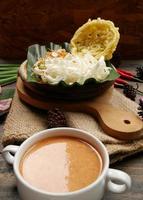 Selective focus of Asinan Betawi. The vegetable asinan of the Betawi people from Jakarta is preserved Chinese cabbage, cabbage, bean sprouts, tofu, and lettuce served with peanut sauce and krupuk photo