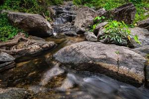 Khlong Nam Lai Waterfall, Beautiful waterfalls in klong Lan national park of Thailand photo