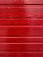 close up of red wooden wall background photo