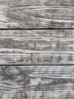 old gray wooden wall made of planks photo