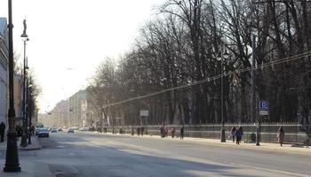 Sunny street in Sankt petersburg city at sunrise photo