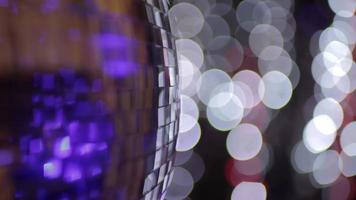 abstract funky discoball spinning with light effects and rays perfect clip for club visuals or party and celebration video