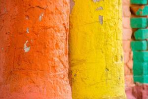 Red and yellow color combination old Textured damage wall photo