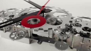 stop motion of a clock watch with lots of gears and cogs video