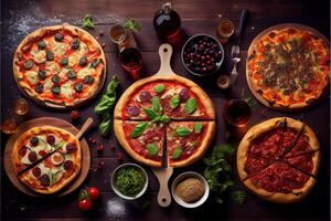 illustration of pizza party dinner. Flat-lay of various kinds of Italian pizza, salad and red wine in glasses over rustic wooden table, top view, wide composition photo