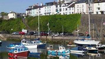 timelapse of the harbour of brixham in devon, england. Brixham is a traditional english seaside town with working fishing port video