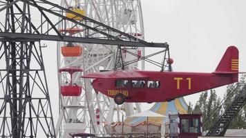 video of the rides in the tibidabo amusement park overlooking the city of barcelona