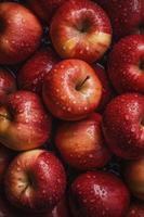 lots of ripe red apples , visible drops of water, generat ai photo