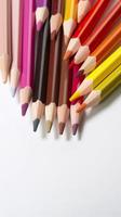 Sharpened colored pencils on white background, generat ai photo